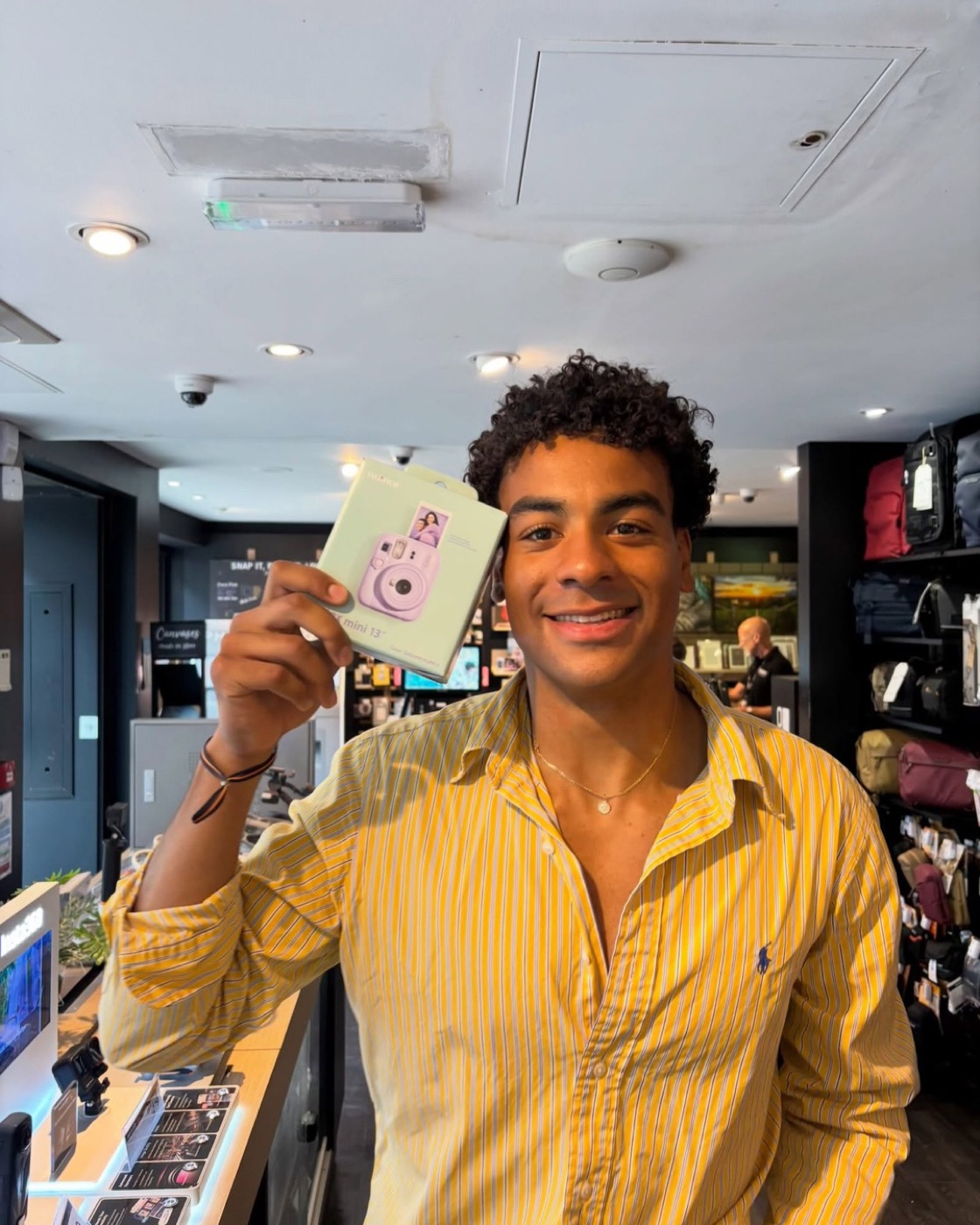 Joren Brook on Instax packaging, TDA London model